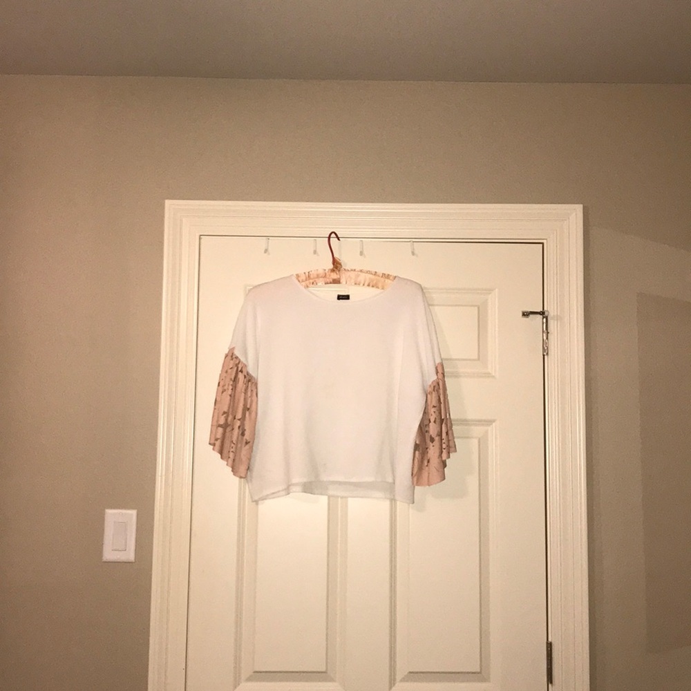 White blouse with pink floral sleeves